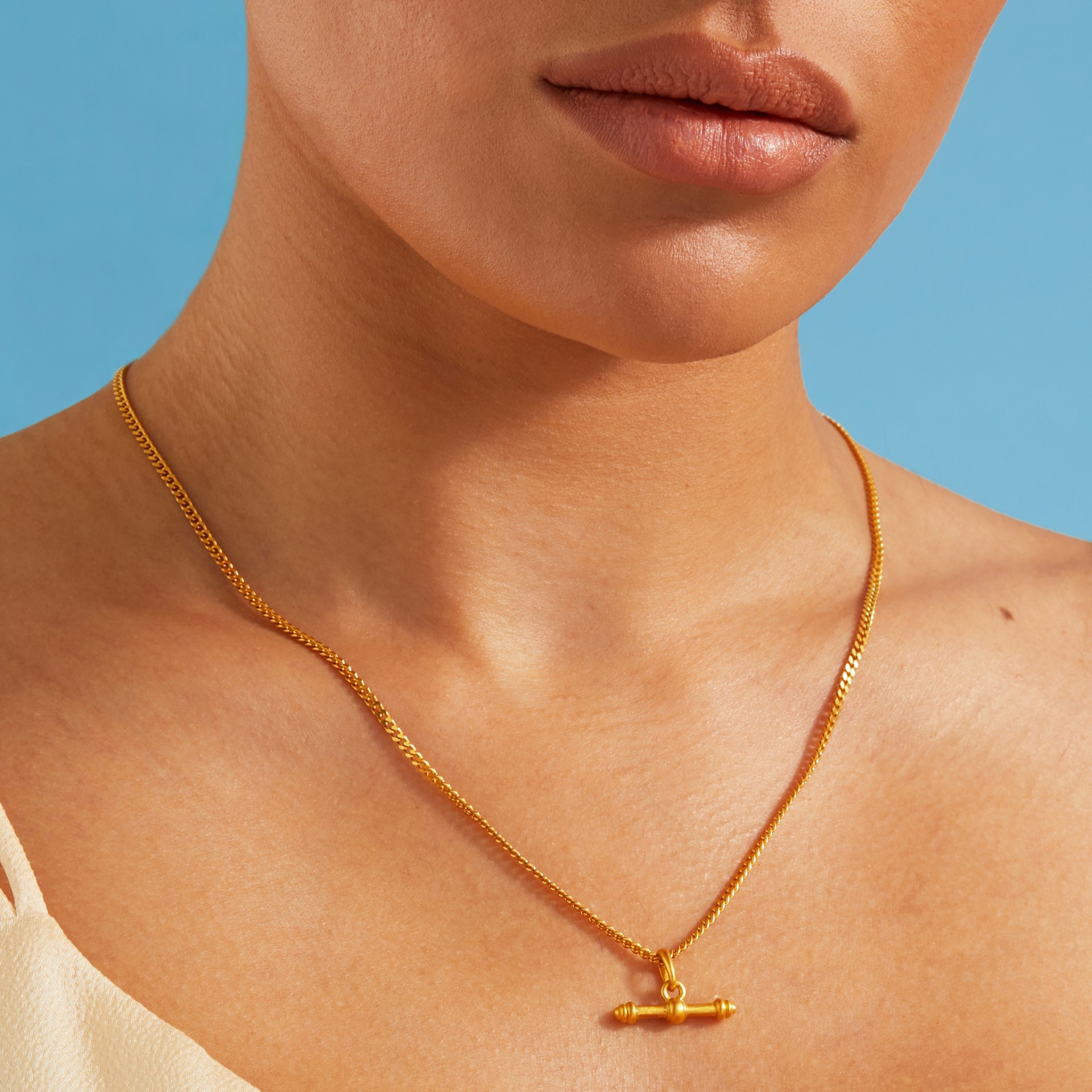 Gold t bar on sale pendant